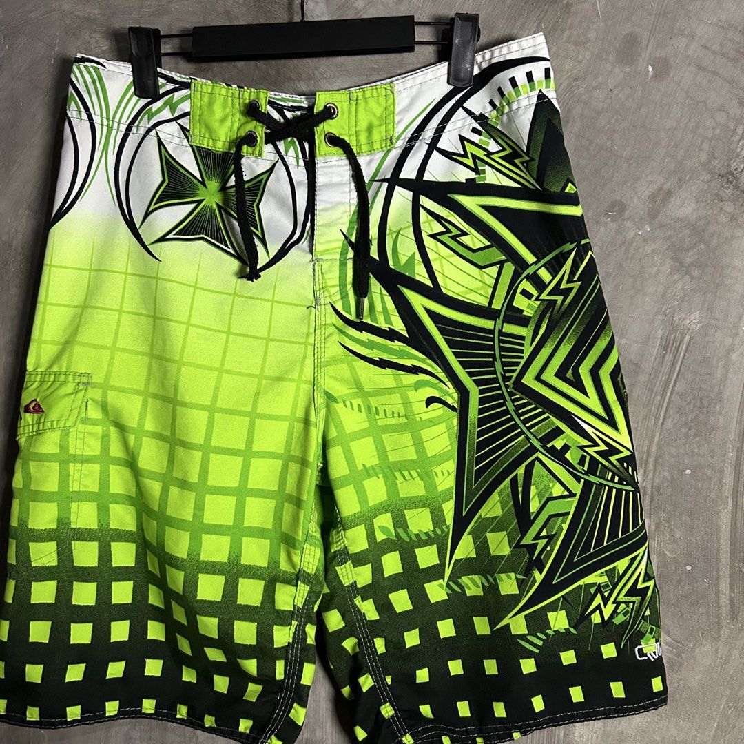 Y2k Quiksilver - Green Boardshort (Category: Swim Trunks & Board Shorts) located in Tayabas. Submitted by streetdepartment (Listing ID 1460901373, Image 2). Description: Y2k Quiksilver - Green Boardshort Measurements (inches): Waist: 32” Length: 22” Leg opening: 11” Tagged as 32 Excellent condition Flaw/s: Loose stitching on velcro.