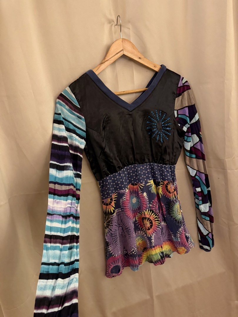 Y2k statement top (Category: Blouses) located in Manila. Submitted by 414studio (Listing ID 1460898884, Image 2). Description: Fits small to med.