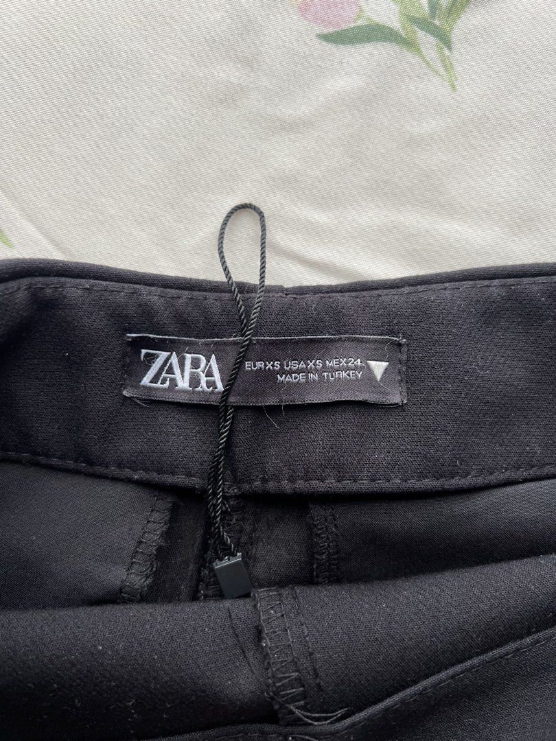 Zara Black Skort XS (Category: Shorts) located in Cabuyao City. Submitted by declutter_w_mee (Listing ID 1460751188, Image 3). Description: - Zara black skort - Size XS - High-waisted - Wrap front detail .