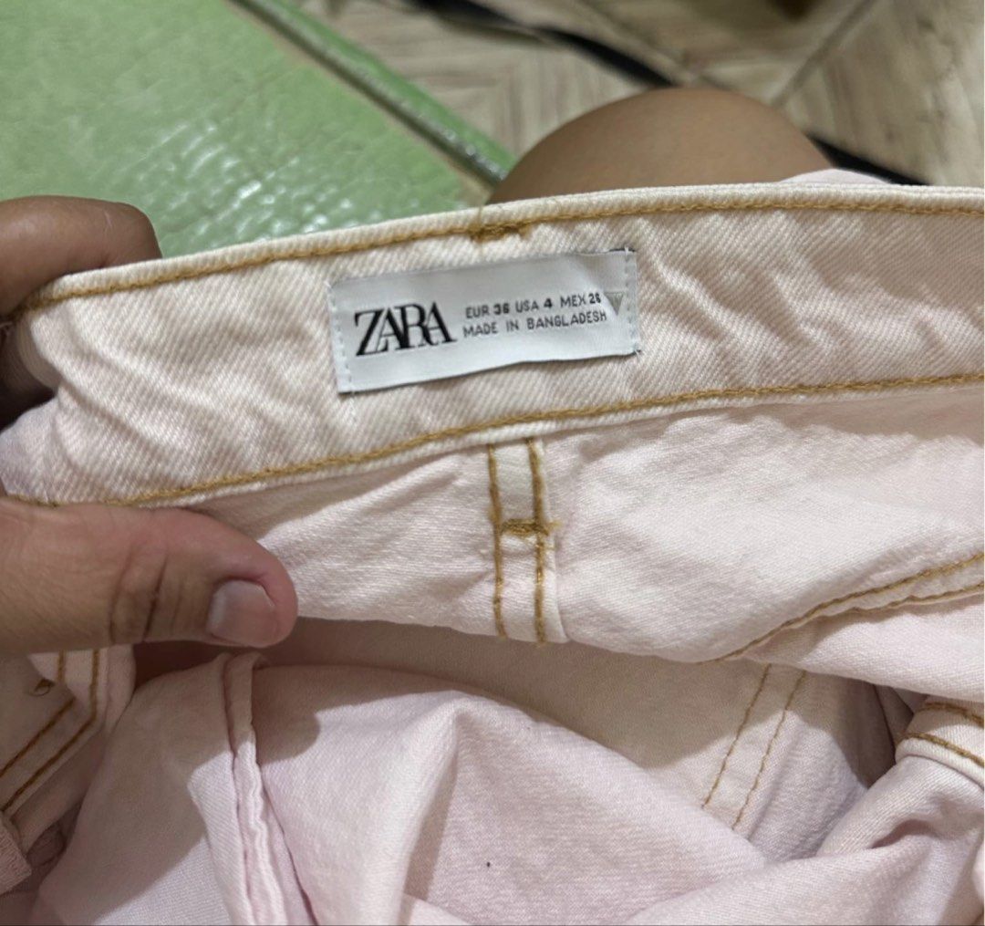 Zara Light Pink Denim Cut-Off Shorts (Category: Shorts) located in Angeles City. Submitted by alejeong27 (Listing ID 1460830014, Image 3). Description: - Zara light pink denim shorts - Cut-off hem with frayed edges - Mid-rise fit - Made in Bangladesh - Ideal for casual wear, pair with tees or blouses.