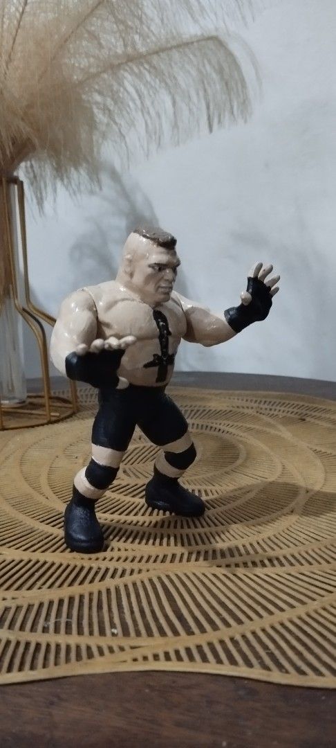 2002 Hasbro WWE Brock Lesnar (Customized) (Category: Action & Battle Toys) located in Manila. Submitted by ventajetoyz625 (Listing ID 1460927595, Image 2). Description: - Customized Vintage Brock Lesnar action figure - Detailed first two tattoos on his chest and left biceps - Rowdy not included (for size ref only) - Ideal for wrestling fans and collectors - What you see is what you get.