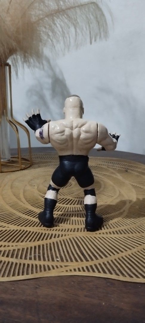 2002 Hasbro WWE Brock Lesnar (Customized) (Category: Action & Battle Toys) located in Manila. Submitted by ventajetoyz625 (Listing ID 1460927595, Image 3). Description: - Customized Vintage Brock Lesnar action figure - Detailed first two tattoos on his chest and left biceps - Rowdy not included (for size ref only) - Ideal for wrestling fans and collectors - What you see is what you get.