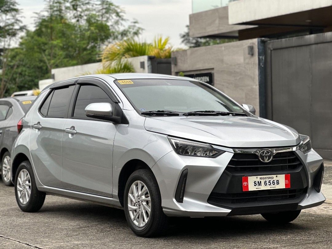 2026 TOYOTA WIGO G (Category: Used Cars) located in Rizal. Submitted by delcars. (Listing ID 1461113023, Image 2). Description: 🚗🔥 TOYOTA WIGO 2026 1.0 G MATIC 🔥🚗 ⭐ TOP OF THE LINE • PUSH START ⭐ 💎 SILVER | Plate # SM 656B 💎 4K ODOMETER ONLY! 💎 VERY FRESH — PARANG BAGO! ✅ Automatic Transmission ✅ 1.0L 3-Cylinder Gas Engine ✅ Push Start ✅ Climate Control ✅ All Stock & Original ✅ Never Flooded ✅ No Accident History ✅ Updated Registration ✅ R