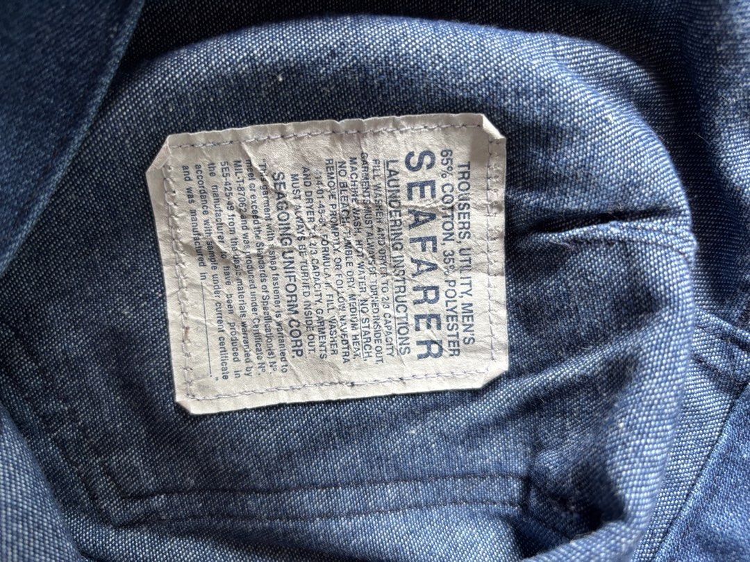 70’s Seafarer Uniform Corp Denim Jeans (Category: Jeans) located in Manila. Submitted by richard26.483 (Listing ID 1460976405, Image 3). Description: - Classic dark wash denim jeans from Seafarer Uniform Corp. - Utility trousers with a polyester blend. - Features a zipper fly and button closure. - Wide leg design with a retro cuff detail. - Ideal for comfortable everyday wear. - US NAVY - 1960- 1980 - dimes waist 34 Lenght 41 - bell bottom -Fold 