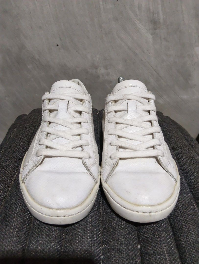 7 Women Lacoste White (Category: Sneakers) located in Cavite. Submitted by ronessabrandedshoes2ndaccount (Listing ID 1460989684, Image 3). Description: - White leather Lacoste sneakers - Classic low-top style - Iconic Lacoste crocodile logo on the side - White laces - White rubber soles - Ideal for casual wear.
