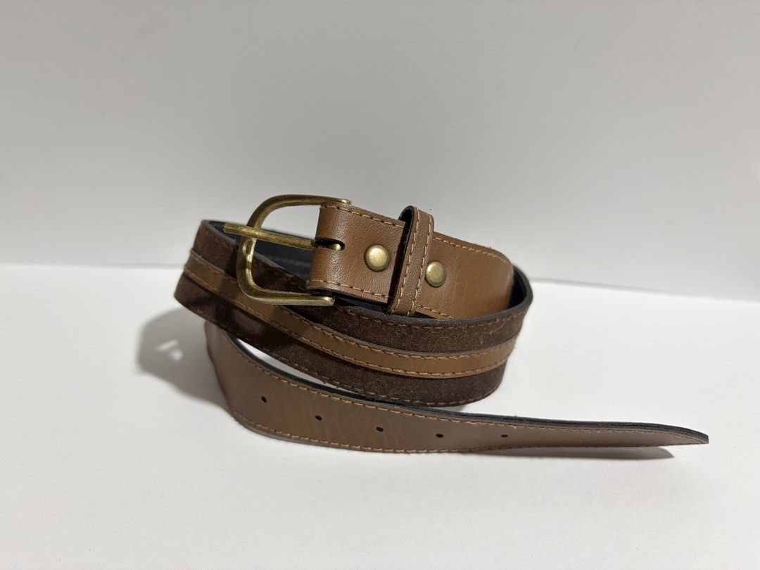 8. Brown Leather Belt 47 (Category: Belts) located in Quezon City. Submitted by wagwagan_ukay_blues (Listing ID 1461042347, Image 2). Description: from Japan in good condition Please expect signs of usage hole size -27” x30” width -1.1” overall -33”.
