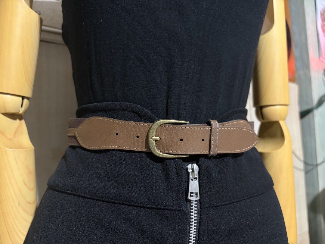 8. Brown Leather Belt 47 (Category: Belts) located in Quezon City. Submitted by wagwagan_ukay_blues (Listing ID 1461042347, Image 1). Description: from Japan in good condition Please expect signs of usage hole size -27” x30” width -1.1” overall -33”.