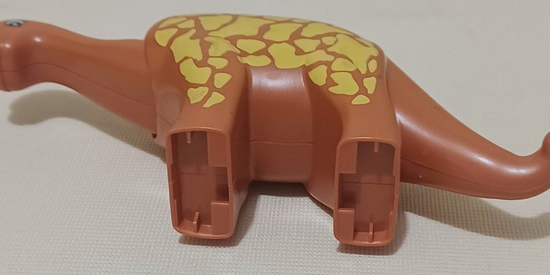 🦕 LEGO Duplo Brachiosaurus Dinosaur (Category: Lego & Building Sets) located in Quezon City. Submitted by wjmae (Listing ID 1461070763, Image 3). Description: ✅ Details: - Genuine LEGO Duplo figure — Brachiosaurus long-neck dino ​ - Size: ~5" tall × 5" long ​ - 4 studs on back — attach Duplo bricks & figures easily ​ - Printed pattern, sturdy thick plastic ​ - Condition: Used with light wear/scuffs — no cracks, no missing pieces ​ - Recommended 