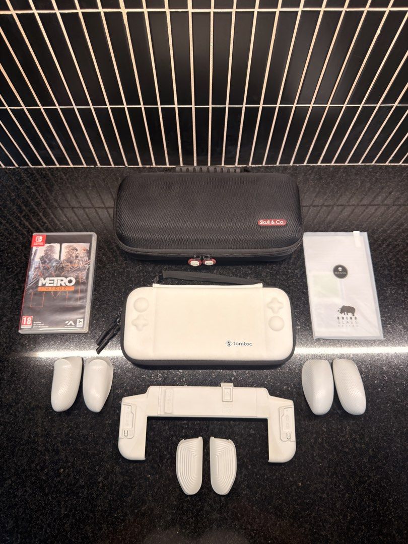 🎮 Nintendo Switch OLED Bundle – PhP12,000.00 (Category: Nintendo) located in Muntinlupa City. Submitted by richdeleon (Listing ID 1461107252, Image 2). Description: Selling my Nintendo Switch OLED, in excellent condition and well taken care of. Fully functional with no known issues. Inclusions: • Nintendo Switch OLED console • Original box and packaging • Original accessories • Skull & Co. Rhino Glass Series Screen Protector – one (1) installed 