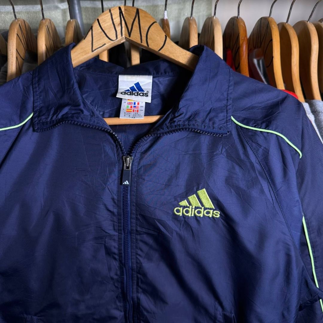 Vintage Adidas Windbreaker (Category: Coats, Jackets and Outerwear) located in Davao. Submitted by demifrogthrift (Listing ID 1461064664, Image 3). Description: 🏷️ Vintage Adidas Windbreaker | Large | Width 22″ Length 26″ Issue: None Color Rate: 9.5/10 ₱699 (Slightly negotiable) + Shipping Fee Send me a message to purchase 📩 Please manage your expectations, All items are Thrifted and some issues may not be seen..