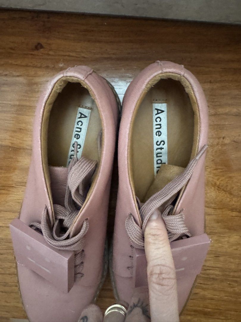 Acne Shoes (Category: Sneakers & Footwear) located in Quezon City. Submitted by AnjRawa (Listing ID 1460956910, Image 3). Description: - Acne Studios pink leather lace-up shoes - Features iconic face motif on the front - Comfortable and stylish for everyday wear - Laces are intact - Soles show some signs of wear - Great addition to any shoe collection.