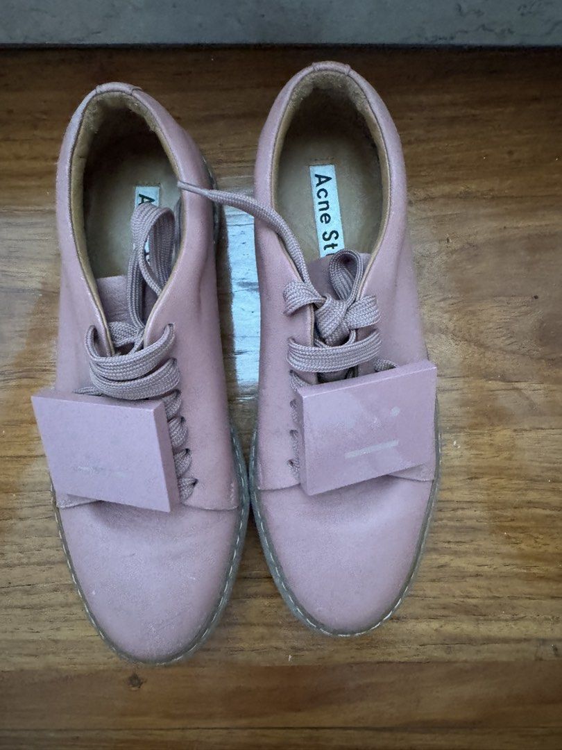 Acne Shoes (Category: Sneakers & Footwear) located in Quezon City. Submitted by AnjRawa (Listing ID 1460956910, Image 2). Description: - Acne Studios pink leather lace-up shoes - Features iconic face motif on the front - Comfortable and stylish for everyday wear - Laces are intact - Soles show some signs of wear - Great addition to any shoe collection.
