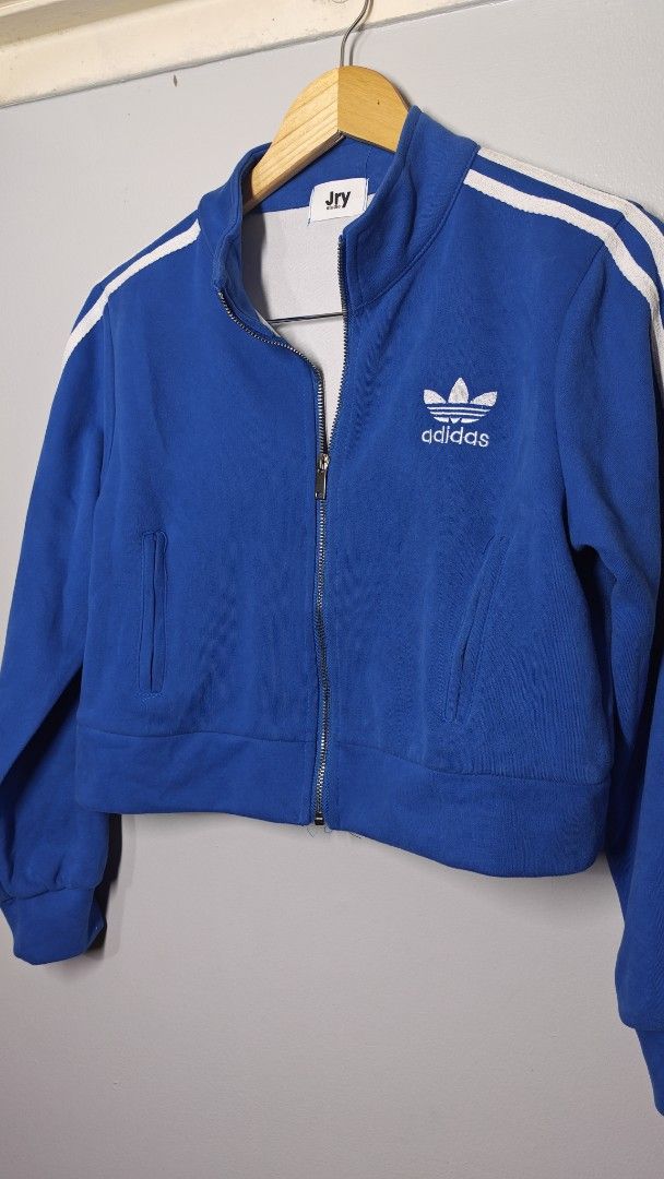 Adi Blue Cropped Track Jacket with White Stripes (Category: Coats, Jackets and Outerwear) located in Manila. Submitted by chubbychic553 (Listing ID 1461091847, Image 3). Description: Preloved Adi cropped 3 stripes jacket Brand: JRYSTUDIO from Bangkok Thailand This brand is known for quality premium coords napakalambot ng fabric Size free size fit to XL Used 2x only No flaw PHP 700 mode of payment gcash BDO paymaya location Tayuman Manila shipping