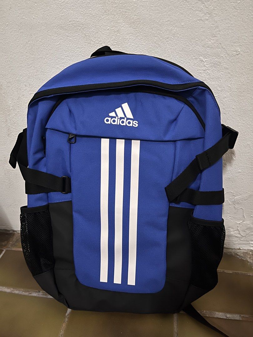 Adidas Backpack Blue with White Stripes (Category: Backpacks) located in Meycauayan. Submitted by ranastridran (Listing ID 1461004023, Image 1). Description: - Classic blue Adidas backpack with iconic white stripes. - Convenient side mesh pockets for water bottles or essentials. - Adjustable straps ensure a comfortable fit for everyone. - Ample interior space for all your belongings. - Ideal for school, gym sessions, or everyday adventures..