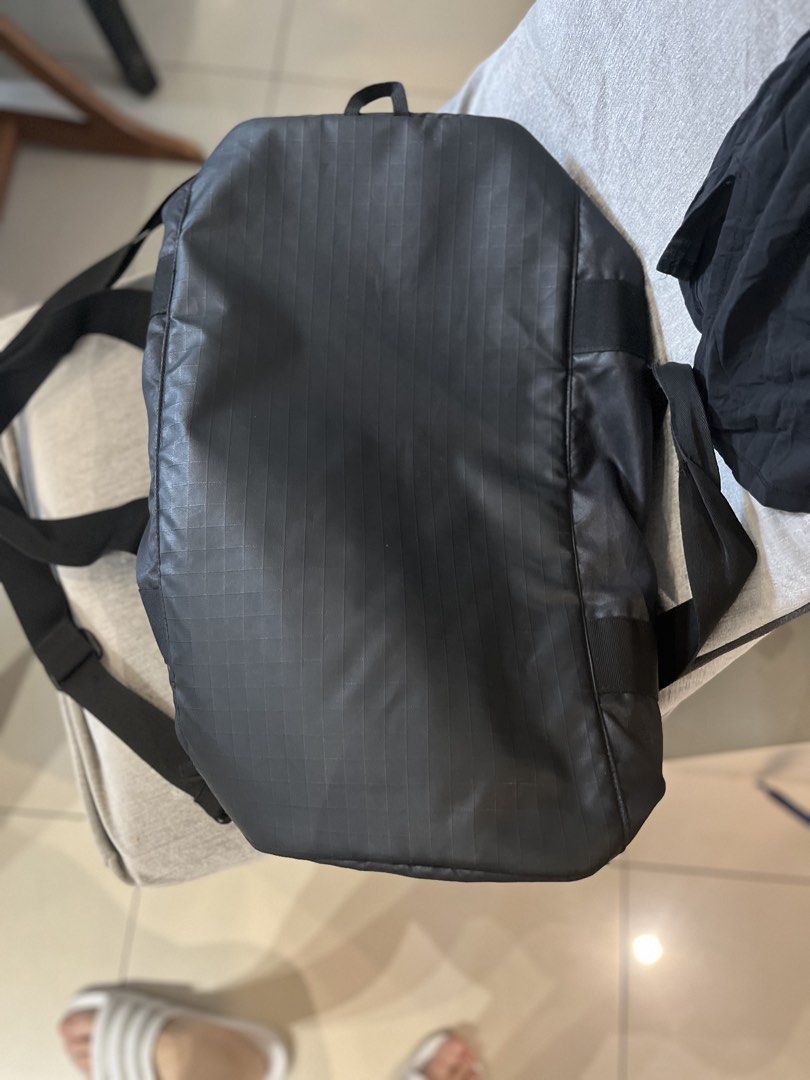 Adidas Black Duffel Bag (Category: Backpacks) located in Manila. Submitted by momfinds.mnl (Listing ID 1460931224, Image 3). Description: - Black Adidas duffel bag - Bright blue interior - Main compartment with zippered closure - Interior mesh pocket with zipper - Durable material - Ideal for gym or travel - Needs wash.