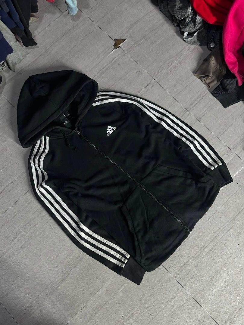 Adidas black full-zip hoodie (Category: Hoodies) located in Manila. Submitted by nb_thriftshop (Listing ID 1461061934, Image 1). Description: full zip adi 25 length 17 width medium no issue need wash .