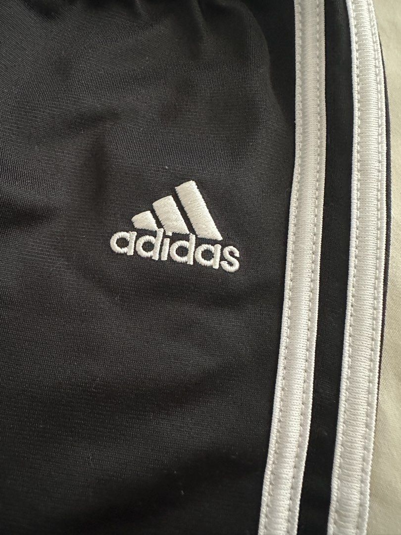 Adidas Black Track Pants with White Stripes (Category: Babies & Kids Fashion) located in Quezon City. Submitted by crslph (Listing ID 1460965675, Image 2). Description: - Classic black Adidas track pants - Iconic white three stripes on sides - Comfortable elastic waistband - Versatile for sports or casual wear - Easy to pair with any outfit -Tag size removed -Size: 18m.