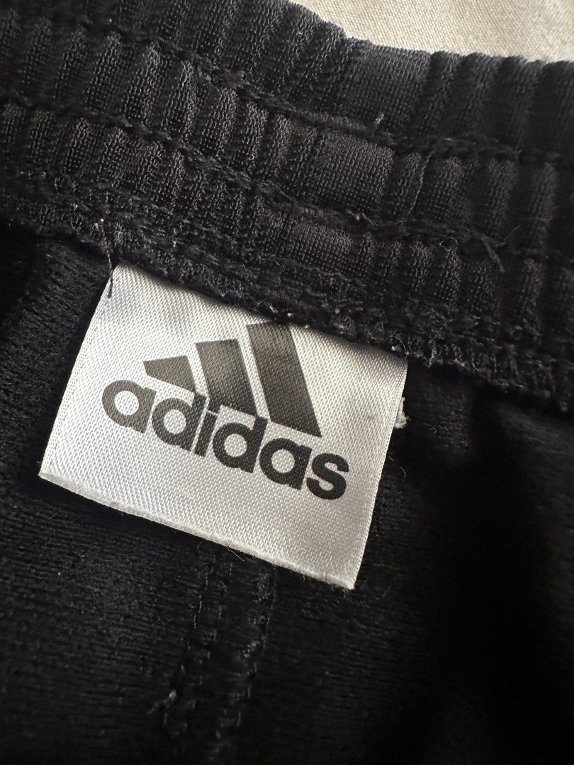 Adidas Black Track Pants with White Stripes (Category: Babies & Kids Fashion) located in Quezon City. Submitted by crslph (Listing ID 1460965675, Image 3). Description: - Classic black Adidas track pants - Iconic white three stripes on sides - Comfortable elastic waistband - Versatile for sports or casual wear - Easy to pair with any outfit -Tag size removed -Size: 18m.