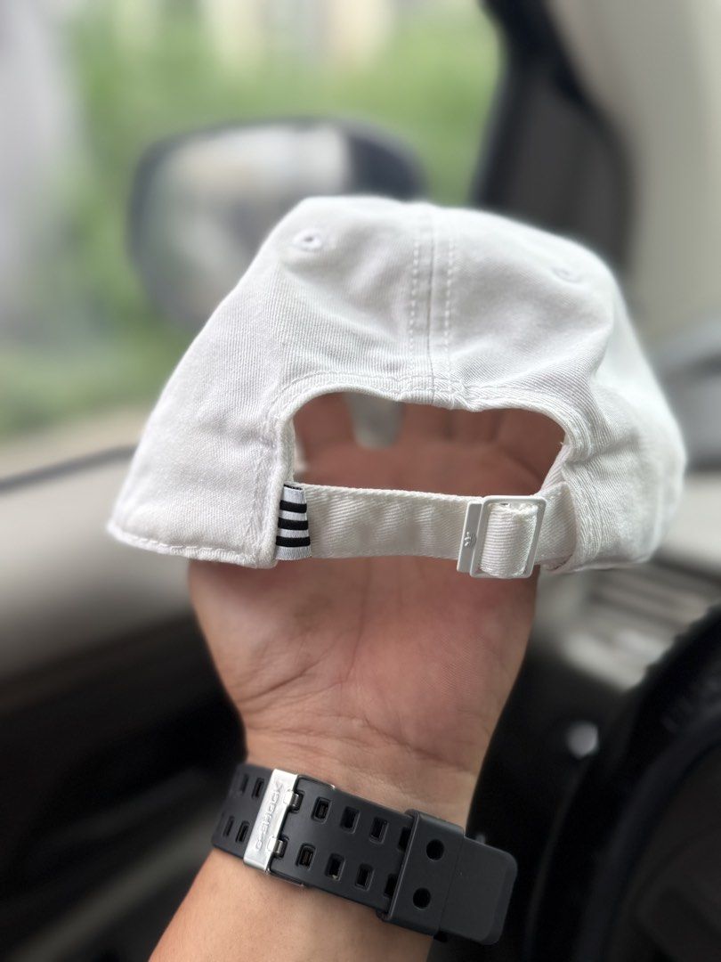 Adidas Cap White with Black Logo (Category: Caps & Hats) located in Bacolod City. Submitted by kitcarsonduff (Listing ID 1461097827, Image 3). Description: - Classic white Adidas cap - Features iconic black trefoil logo - Adjustable strap for a comfortable fit - Simple and versatile for everyday wear - Matches any outfit.