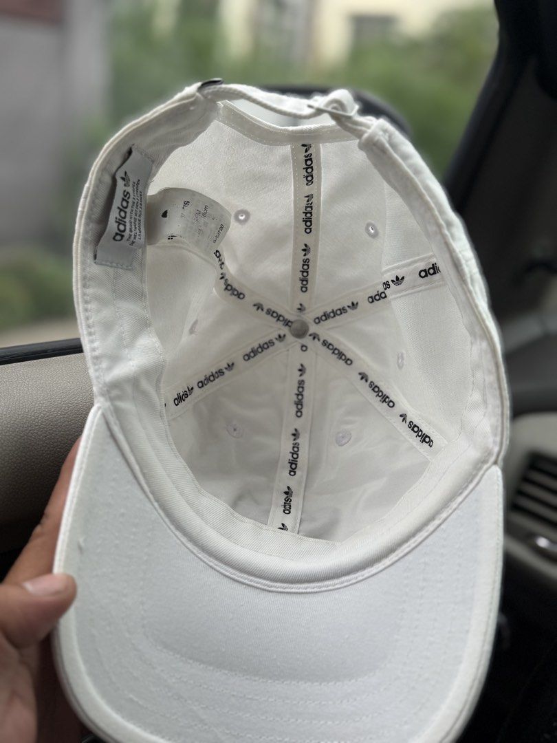 Adidas Cap White with Black Logo (Category: Caps & Hats) located in Bacolod City. Submitted by kitcarsonduff (Listing ID 1461097827, Image 2). Description: - Classic white Adidas cap - Features iconic black trefoil logo - Adjustable strap for a comfortable fit - Simple and versatile for everyday wear - Matches any outfit.