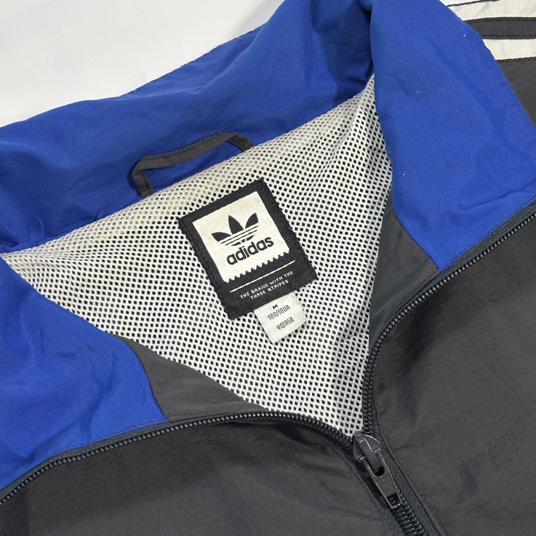 Adidas Colorblock Track Jacket (Category: Coats, Jackets and Outerwear) located in Cavite. Submitted by sidirvinp76902 (Listing ID 1460961636, Image 3). Description: - whit issue tiny pinholes but still in excellent condition ganda nito! Cool Adidas track jacket - Bold colorblock design: green, black, and blue panels - Classic three stripes on sleeves - Adidas trefoil logo on chest and sleeves - Zipper closure - Great for casual wear.