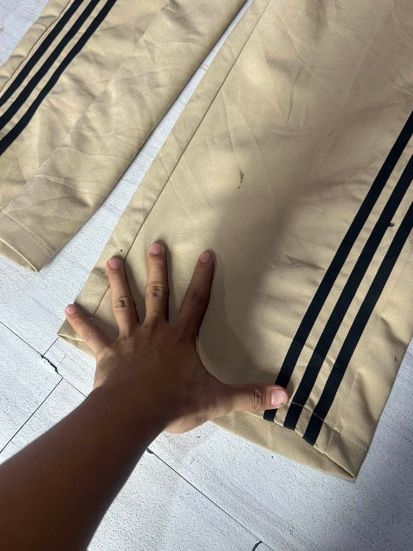 Adidas cream trouser pants (Category: Trousers) located in Manila. Submitted by nb_thriftshop (Listing ID 1461072187, Image 3). Description: adi pants waist 26 length 40 leg hole 11 no issue need wash.