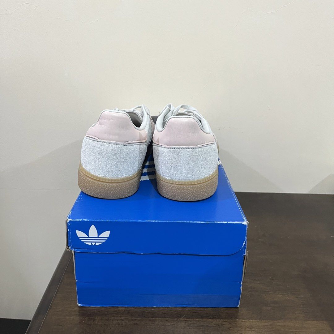 Adidas Handball Spezial W (Category: Sneakers) located in Paranaque City. Submitted by edf092579 (Listing ID 1461111458, Image 3). Description: - Adidas Handball Spezial W sneakers - Color: Light grey with pink stripes and heel tab - Sole: Gum sole - Condition: Comes with original box - Size: US Women's 9.5 US Men’s 8.5 Shipping fee will be shouldered by the buyer.