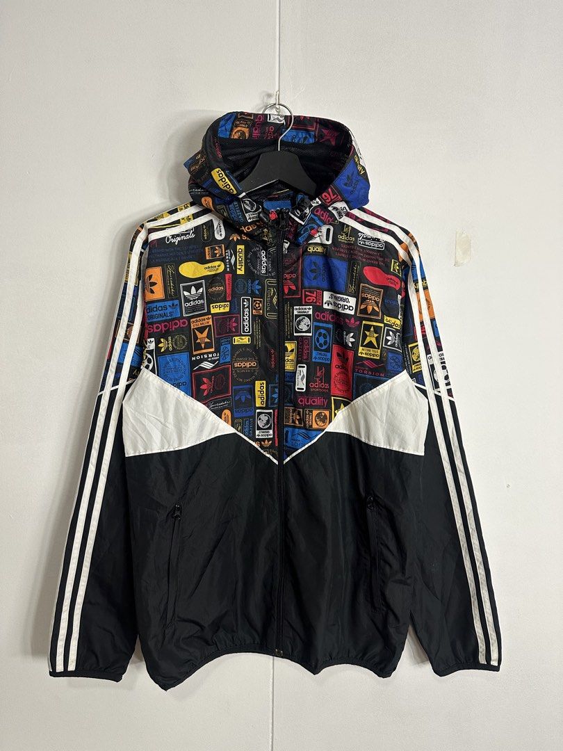 Adidas Windbreaker (Category: Coats, Jackets and Outerwear) located in Las Pinas. Submitted by archimedes.joaquin (Listing ID 1461055155, Image 1). Description: Good as new - 9.7/10 color rate - half AOP design sz Large 21.5 width 28 length - No issue Authentic.