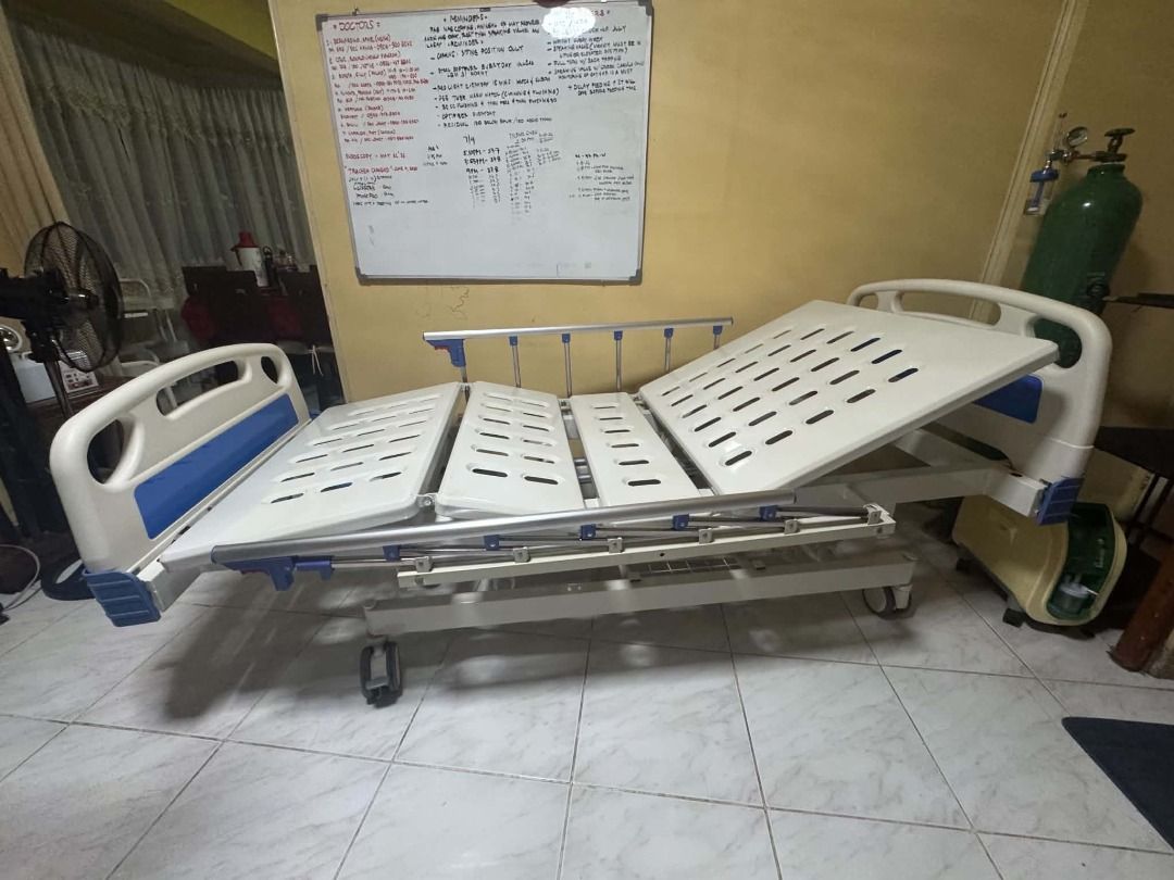 ADJUSTABLE BED — 6 MONTHS USED (Category: Medical Supplies & Tools) located in Quezon City. Submitted by rombomaqui (Listing ID 1461057280, Image 3). Description: 6 MONTHS USED — GOOD AS NEW! 2 Crank Bed for Sale Well-maintained and gently used for only 6 months. In very good condition and fully functional. Features: • Adjustable headrest/backrest — manually operated using hand cranks • Collapsible side rails with safety locks • Locking caster wh