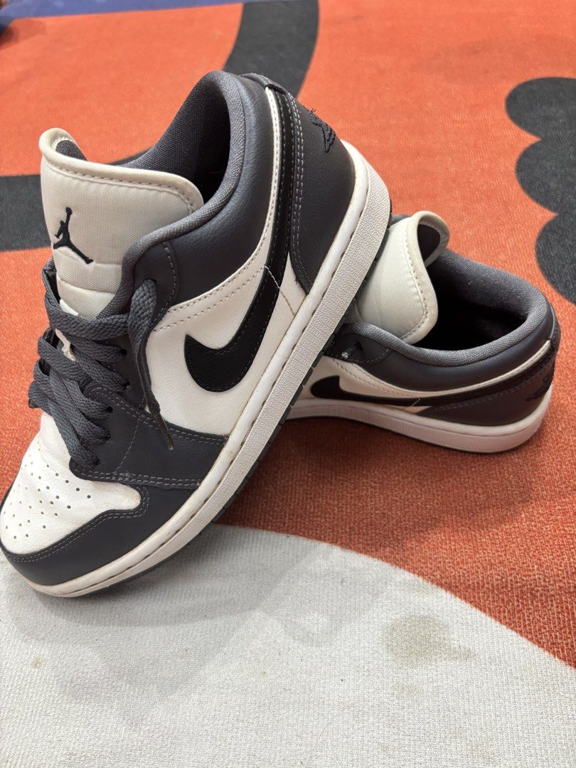 Air Jordan 1 Low Grey White Black (Category: Sneakers) located in Alicia. Submitted by thriftbagph (Listing ID 1461078127, Image 1). Description: - Classic Air Jordan 1 Low - Colorway: Grey, white, and black - Low-top silhouette - Grey laces - Minor scuffs on soles - Ideal for casual wear - slightly used.