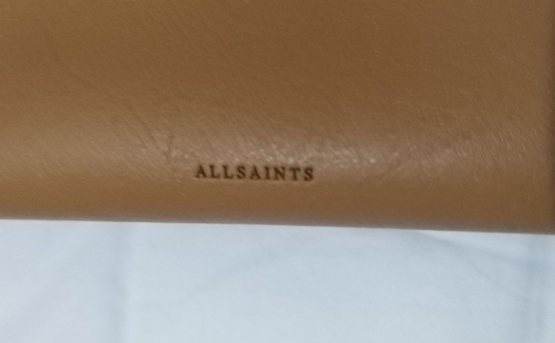 ALLSAINTS Leather Shoulder Bag Tan (Category: Shoulder Bags) located in Manila. Submitted by nezzzra (Listing ID 1460937928, Image 3). Description: - ALLSAINTS tan leather shoulder bag - Soft, slouchy design - leather and chain shoulder strap - used once or twice - small flaw on the INSIDE of bag (see photo) -price is negotiable.