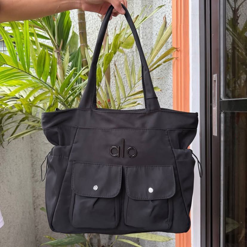 Alo Utility Tote Bag (Category: Tote Bags) located in Guinobatan. Submitted by jadieee_young22 (Listing ID 1461072290, Image 3). Description: Alo utility tote bag ₱1,600 each • premium quality • actual photos | what you see is what you get • goods for school or work or travel!.