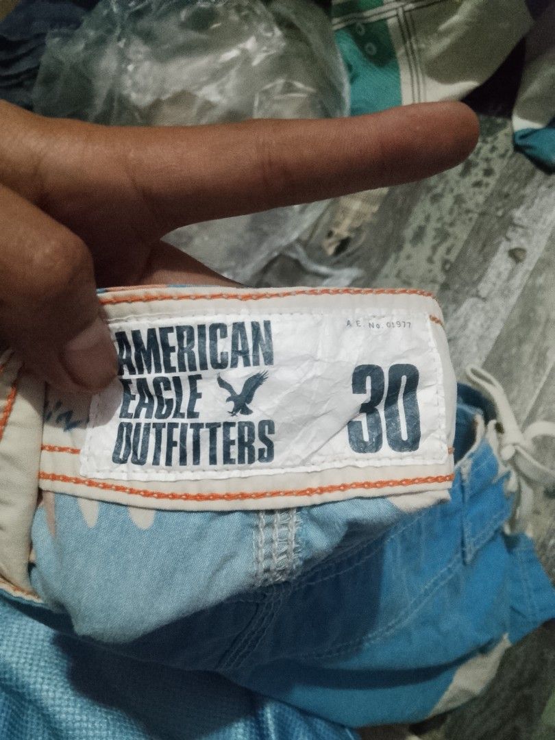 American Eagle Outfitters Board Shorts Size 30 (Category: Shorts) located in Quezon City. Submitted by theoneshop1 (Listing ID 1461069824, Image 2). Description: - Brand: American Eagle Outfitters - Color: Blue and white pattern - Features: Back pocket with button closure, adjustable drawstring waist - Ideal for: Swimming, beach, casual wear.