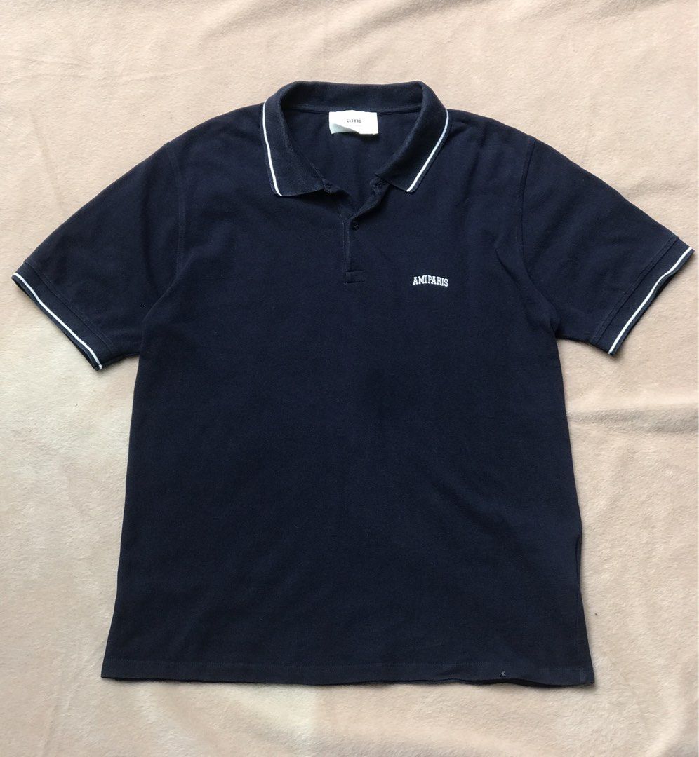 Ami paris (Category: Tshirts & Polo Shirts ) located in Alicia. Submitted by aljaber43 (Listing ID 1460989104, Image 1). Description: Ami polo shirt Authentic 100% Excellent condition .