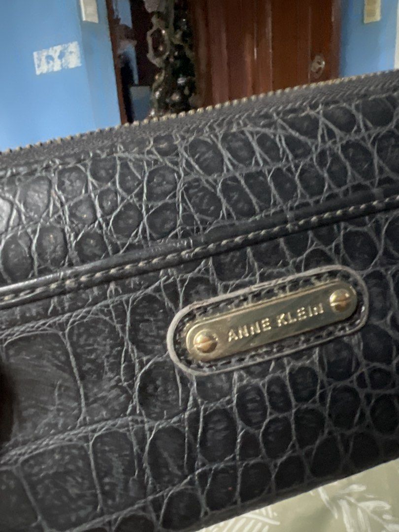 Anne Klein Black Croc Embossed Zip Around Wallet (Category: Wallets & Card holders) located in Lipa City. Submitted by wen_68 (Listing ID 1460991320, Image 2). Description: - Brand: Anne Klein - Color: Black - Exterior: Croc-embossed texture - Closure: Zip-around - Interior: Multiple card slots and compartments - Functionality: Great for organizing your essentials.