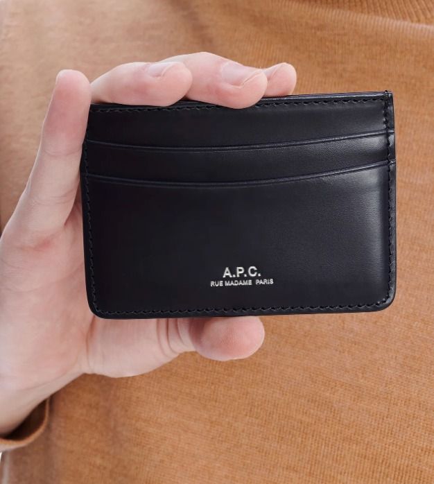 A.P.C. André Cardholder (Category: Wallets & Card holders) located in Pasig City. Submitted by sqfund (Listing ID 1461036691, Image 1). Description: - Authentic A.P.C. André Cardholder card holder - Bought at A.P.C. Powerplant - Minimal signs of use (check photos) - Two card slots on one side and one on the other. - Silvertone embossed 'A.P.C. Rue Madame Paris' logo - Dimensions: 10 x 7 cm ✨Excellent condition✨ ___________________________________
