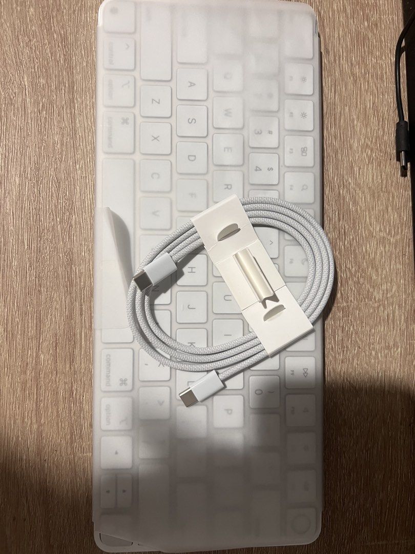 APPLE KEYBOARD WITH TOUCH ID (Category: Luxury Accessories) located in Las Pinas. Submitted by sashimex (Listing ID 1461083479, Image 1). Description: COMPLETE WITH USB-C. Extra lang po. I prefer COP para you are also protected. .