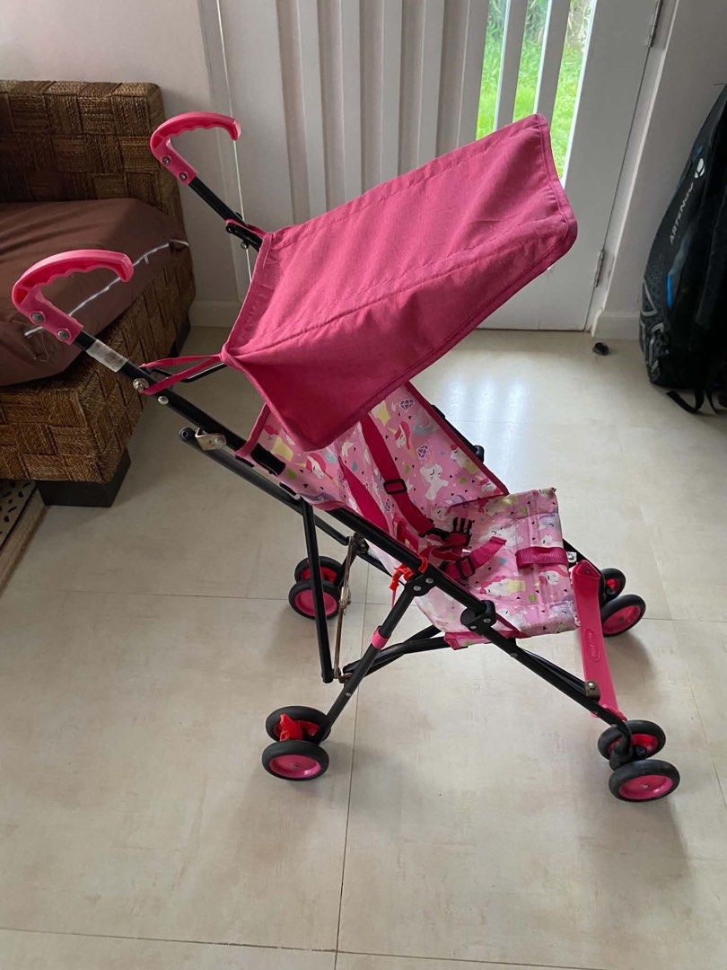 Apruva Pink Unicorn Print Lightweight Stroller (Category: Strollers) located in Manila. Submitted by declutterforamari (Listing ID 1461010313, Image 3). Description: - Adorable pink stroller with a fun unicorn print. - Built-in canopy for sun protection. - Secure 5-point harness for your child's safety. - Folds compactly for easy storage and travel. - Ideal for parents on the go!.