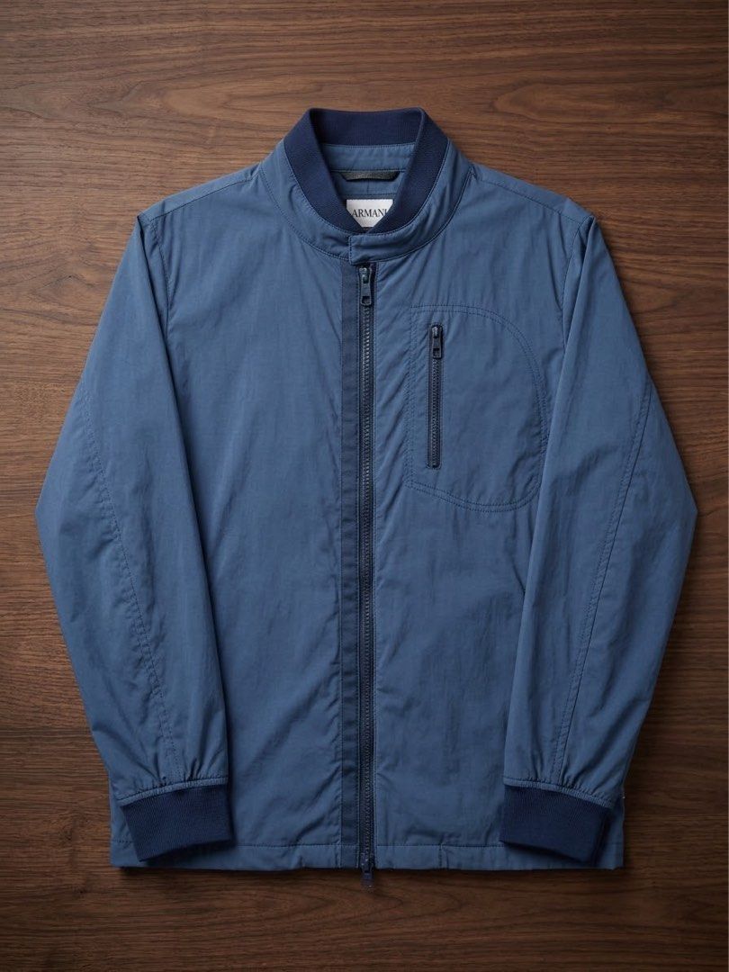Armani Collezione Water Repellent (Category: Coats, Jackets and Outerwear) located in Baguio. Submitted by thecollector2600 (Listing ID 1460979780, Image 1). Description: Excellent Large 23 x 29 No discoloration. The picture is affected by lighting but no discoloration .