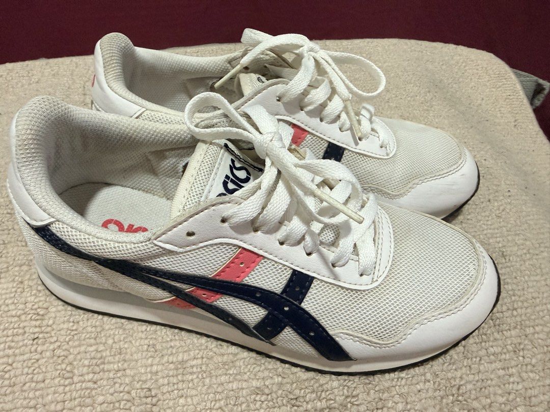 Asics White Sneakers Size 6 (Category: Sneakers) located in Batangas. Submitted by cathevans (Listing ID 1460976187, Image 1). Description: - White Asics sneakers - Size: 23.5cm - Breathable mesh upper - Navy and pink stripe accents - White laces - Pink Asics logo on the heel.