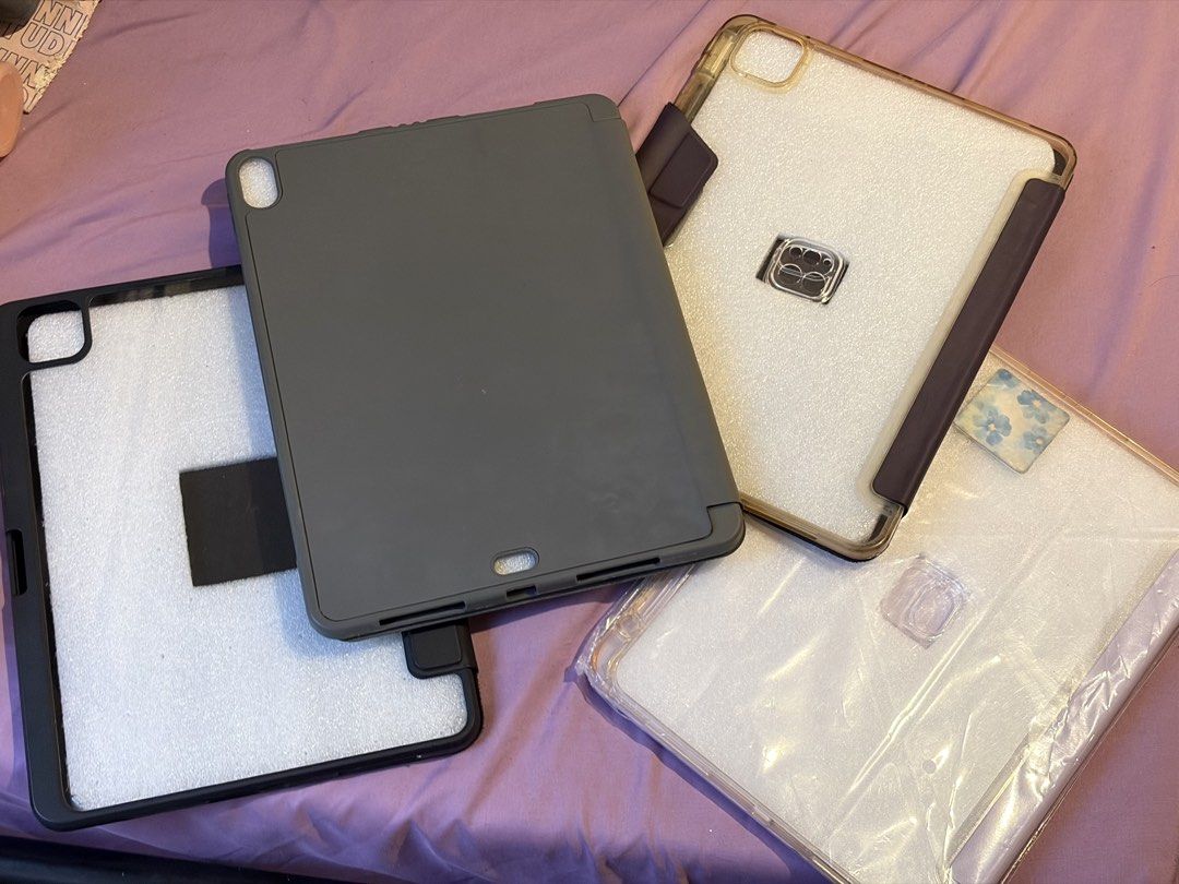 Assorted Apple Cases (iPhone 17, iPad Air 5, Airpods Pro 2) (Category: Cases & Sleeves) located in Quezon City. Submitted by mkdeclutters_ (Listing ID 1461014674, Image 2). Description: - Take all for 380 pesos! - 4 iPad Air 5 cases (3 with acrylic likod) - 2 clear iPhone 17 cases - 2 Airpods Pro 2 cases - Refer to image for flaws.