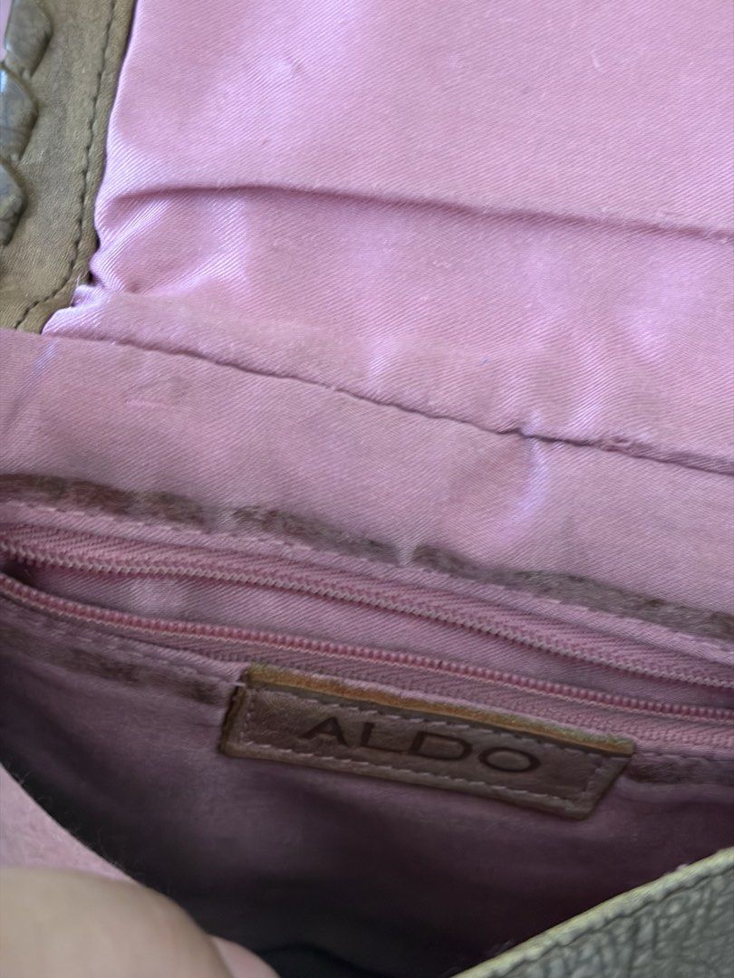 Assorted bags (take all) (Category: Cross-body Bags) located in Quezon City. Submitted by mkdeclutters_ (Listing ID 1460979156, Image 2). Description: - Bundle of four bags - Check photos for signs of usage - Small tan Aldo sling bag with embroidered front - Black Bagsmart padded bag with shoulder strap - Black Regatta sling bag - White faux leather Regatta shoulder bag .