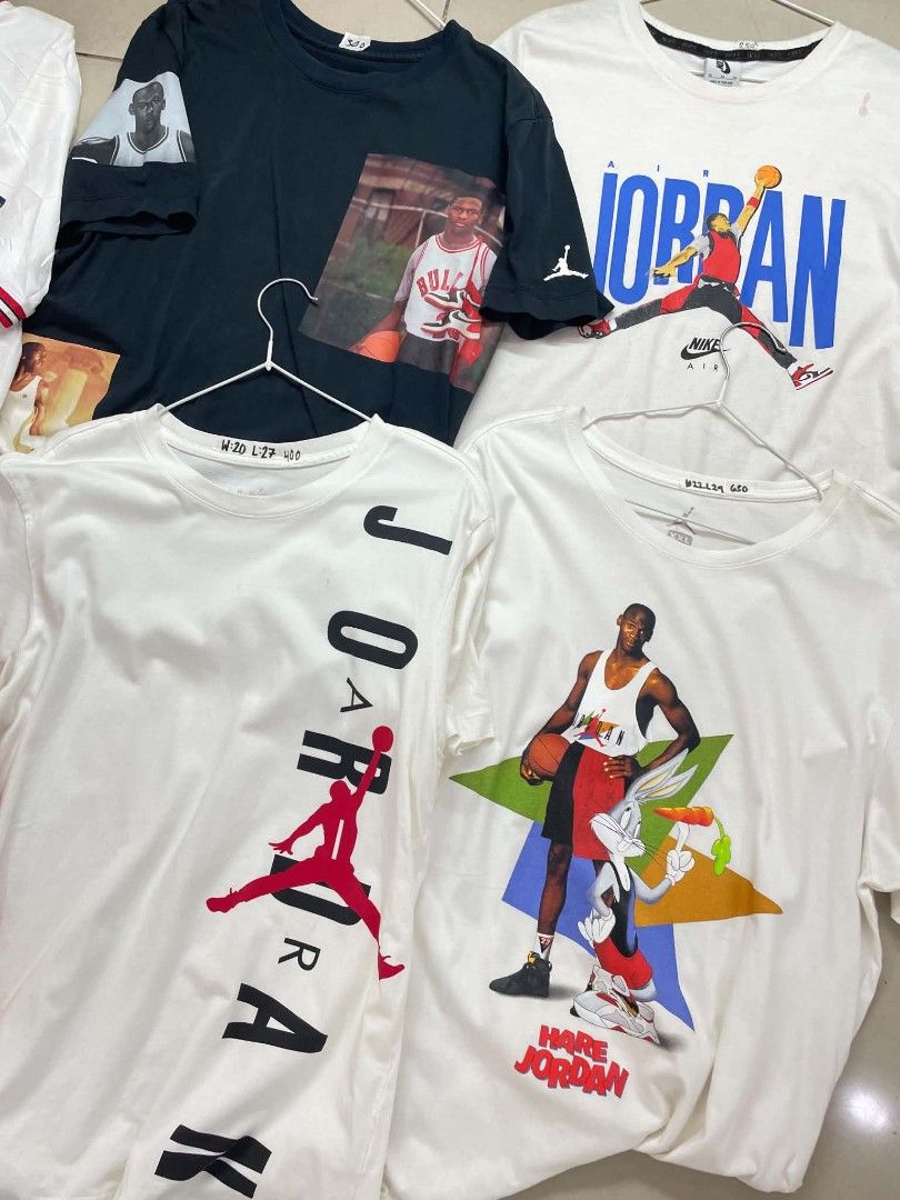 Assorted Graphic T-shirts - Jordan, PSG, Melo (Category: Tshirts & Polo Shirts ) located in Cainta. Submitted by mariss.luxx (Listing ID 1461048260, Image 2). Description: - Bundle of graphic tees - Includes Paris Saint-Germain jersey style shirt - Several Michael Jordan graphic tees, one featuring Bugs Bunny - Includes a Carmelo Anthony (Melo) graphic tee - Ideal for basketball and football fans - All shirts are short-sleeved - Various sizes and