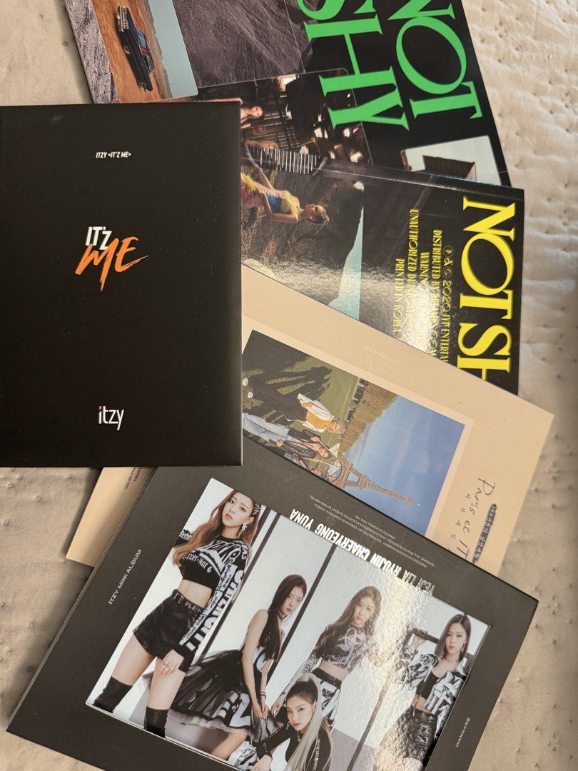 Assorted Itzy albums (Category: K-Wave Merchandise) located in Taguig. Submitted by sqaumejada (Listing ID 1460924790, Image 1). Description: Take all for 700, no issue, stored carefully, pick up in BGC.