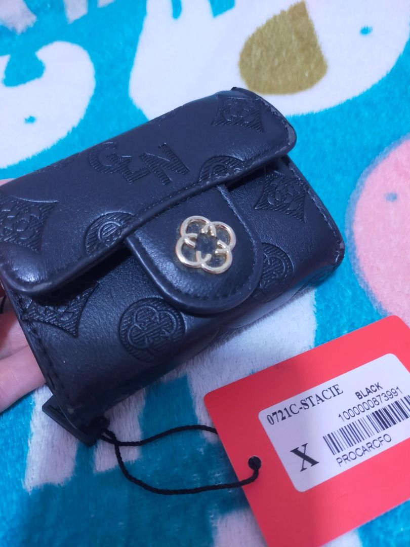 Authentic CLN Stacie Card Wallet (Category: Luxury Bags & Wallets) located in Quezon City. Submitted by zeascloset (Listing ID 1460972154, Image 3). Description: Looking for a cute and practical wallet? This one's for you! 🖤 The elegant black finish paired with its eye-catching gold-tone clasp gives it a classy look, while its spacious interior keeps your cards, cash, coins, and essentials organized..
