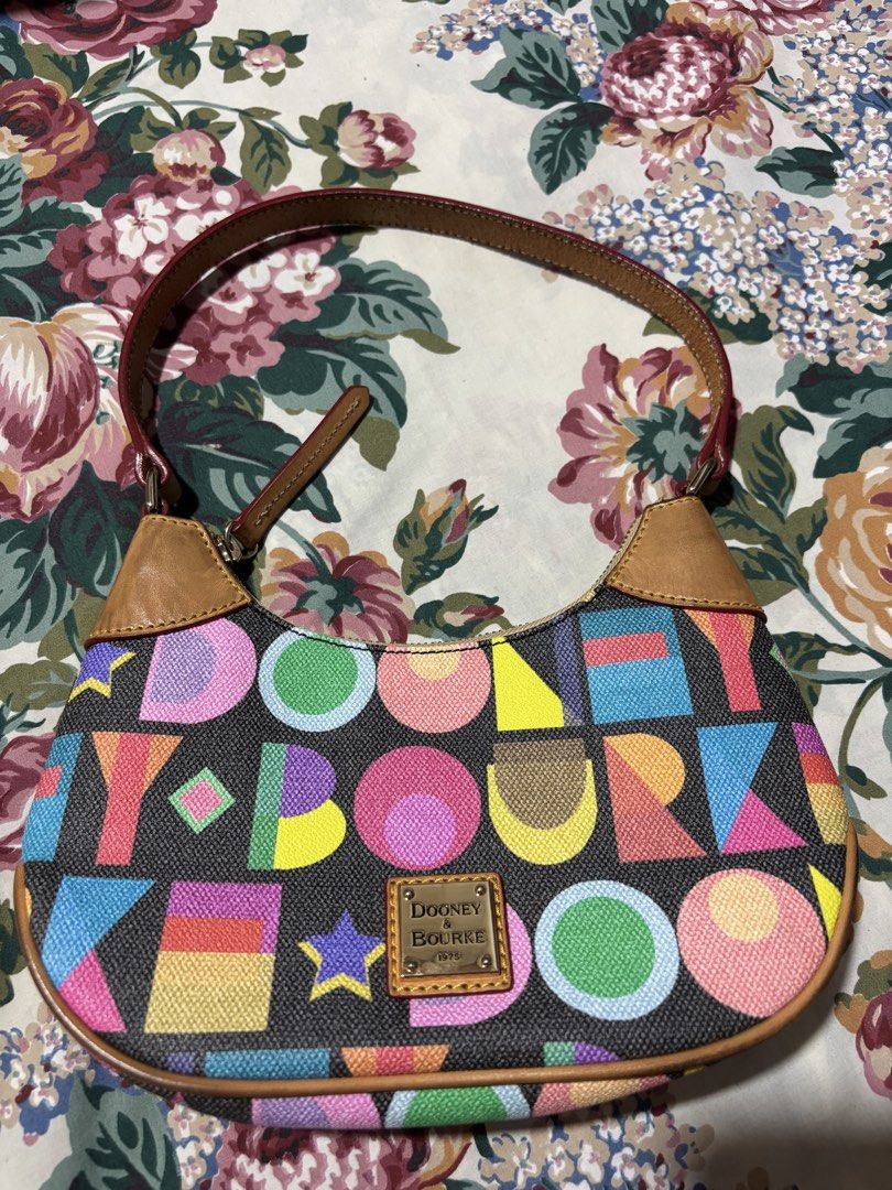 Authentic Dooney & Bourke Art Deco Luna Hobo Bag (Category: Luxury Bags & Wallets) located in Quezon City. Submitted by jhaediah (Listing ID 1461059019, Image 2). Description: Authentic Preloved with dustbag With signs of used.