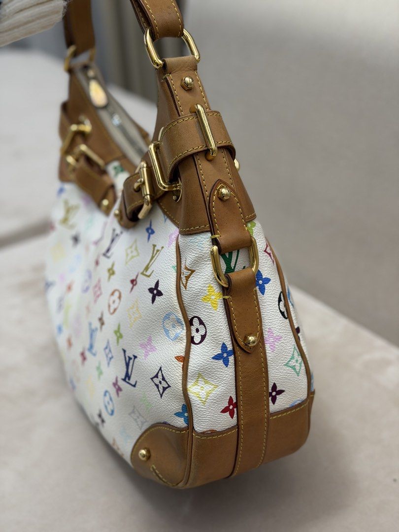 Authentic Louis Vuitton Murakami Greta Shoulder Bag (Category: Luxury Bags & Wallets) located in Manila. Submitted by maria_2326 (Listing ID 1461027055, Image 3). Description: Louis Vuitton Multicolor Greta Bag Guarantee Authentic W/ dust bag only Flaw: signs of wear, corner wears, please see last photo.