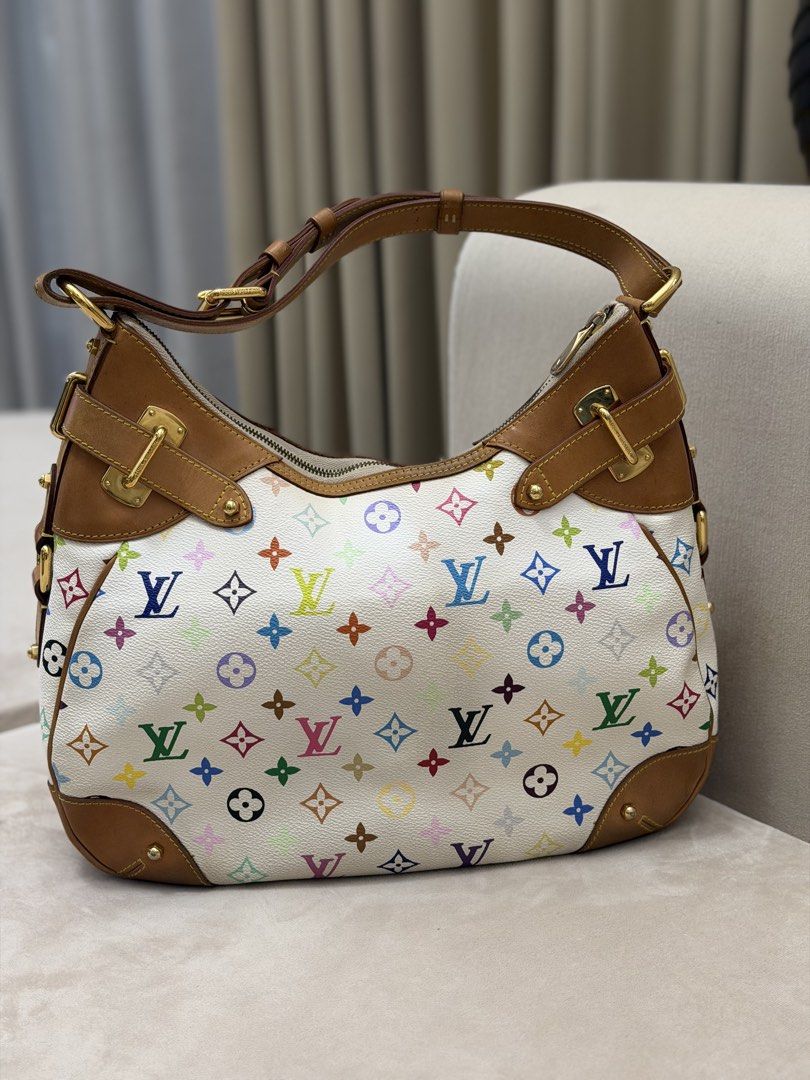 Authentic Louis Vuitton Murakami Greta Shoulder Bag (Category: Luxury Bags & Wallets) located in Manila. Submitted by maria_2326 (Listing ID 1461027055, Image 2). Description: Louis Vuitton Multicolor Greta Bag Guarantee Authentic W/ dust bag only Flaw: signs of wear, corner wears, please see last photo.