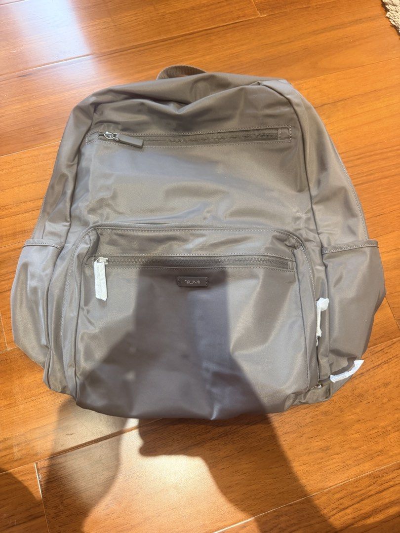 AUTHENTIC TUMI FOLDABLE NYLON BACKPACK - BRAND NEW WITH BAG AND TAG (Category: Backpacks) located in Paranaque City. Submitted by mglrds (Listing ID 1460935196, Image 2). Description: - Gray/Silver Tumi Foldable Backpack - Bought from Canada Outlet as Pasalubong - RFS: item for women; not for me - must go asap - BRAND NEW - With Bag and Tag/original packaging -Pick up at BF Homes Parañaque -payment via gcash/bpi -Negotiable but I don't have too m