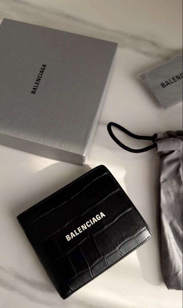 Balenciaga bifold wallet (Category: Luxury Bags & Wallets) located in Manila. Submitted by beaumontandco (Listing ID 1461046748, Image 1). Description: Can really pass as brandnew Mens Croc With care cards Box Dustbag.